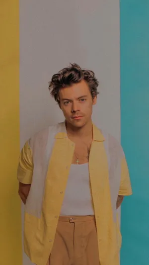 Iphone Harry Styles In A Yellow Polo Wallpaper