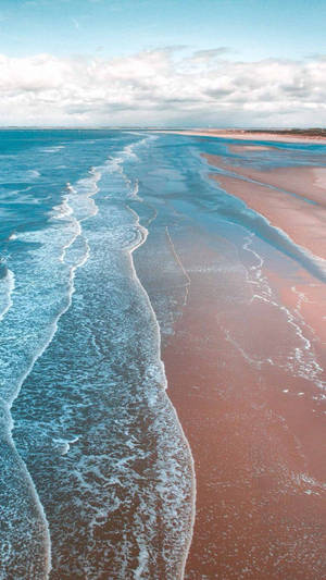 Iphone Xs Ocean Waves Sandy Shore Wallpaper