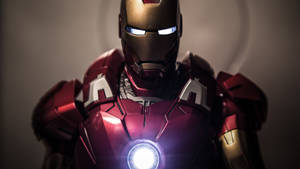 Iron Man Superhero Glowing Arc Reactor Wallpaper