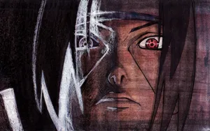 Itachi Uchiha With His Mangekyou Sharingan Wallpaper