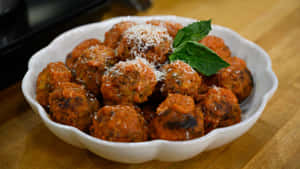 Italian Meatballswith Tomato Sauceand Cheese Wallpaper