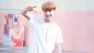 J-hope Doing Peace Sign Wallpaper