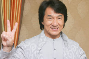 Jackie Chan Waving Peace Sign Wallpaper