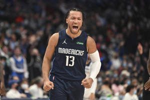 Jalen Brunson Basketball Player Screaming Wallpaper