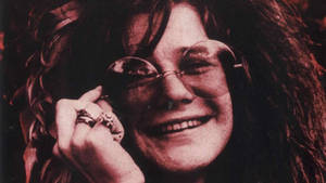 Janis Joplin's Vintage Verve - The Essence Of Psychedelic Era Music Wallpaper