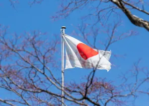 Japan Flag With Blue Sky View Wallpaper