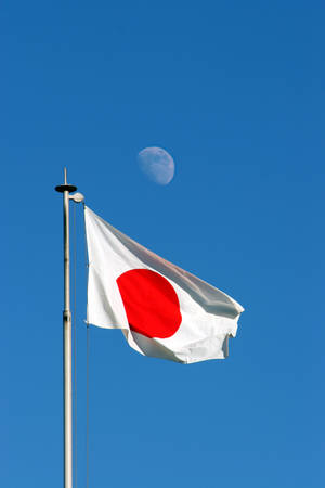 Japan Flag With Moon Behind Wallpaper
