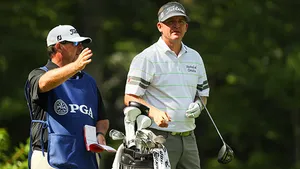 Jason Bohn Confidently Swinging During A Golf Tournament Wallpaper