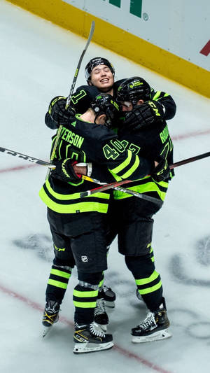 Jason Robertson Dallas Stars Group Hug Wallpaper