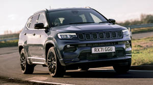 Jeep Compass On Curved Road Wallpaper