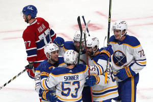 Jeff Skinner Celebrating A Victory With Buffalo Sabres Wallpaper