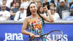 Jelena Jankovic Celebrating With A Jubilant Fist Pump Wallpaper