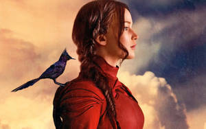 Jennifer Lawrence With Black Mockingjay Bird Wallpaper