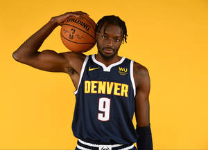 Jerami Grant Denver Holding A Ball Wallpaper