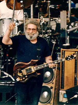 Jerry Garcia Onstagewith Guitar Wallpaper