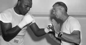 Jersey Joe Walcott Training With His Coach Wallpaper