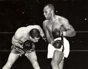 Jersey Joe Walcott Vs Louis' Fight At Madison Square Wallpaper