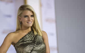 Jessica Simpson In A Gold Dress Wallpaper