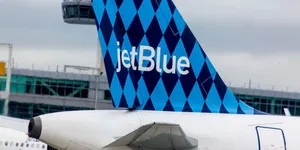 Jetblue Airplane Rudder Blue Diamond Pattern Wallpaper