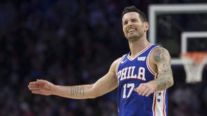 Jj Redick With A Cheerful Look Wallpaper
