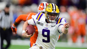 Joe Burrow Confidently Pointing During A Game Wallpaper