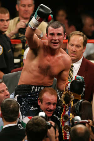 Joe Calzaghe Carried By His Coach Wallpaper