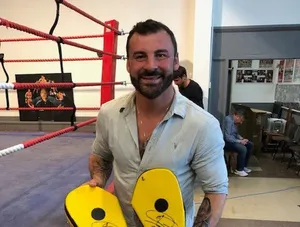 Joe Calzaghe Signing His Fan's Punching Mitts Wallpaper