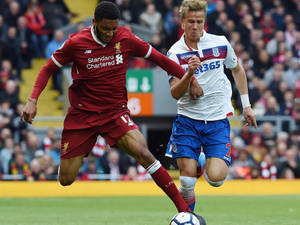 Joe Gomez Going Against Opponent Wallpaper