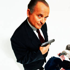 Joe Pesci Holding A Gun Wallpaper