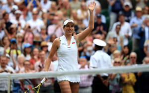 Johanna Konta Waving To Audience Wallpaper