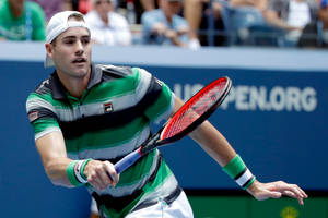 John Isner Running In The Court Wallpaper