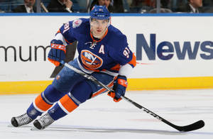 John Tavares Sliding New York Islanders Wallpaper