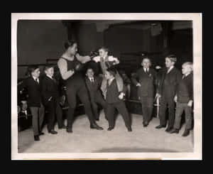 Johnny Dundee Training Boxing With Cute Kids Wallpaper