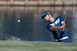 Jon Rahm With The Flying Ball Wallpaper