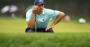 Jonathan Byrd Sitting In Golf Course Wallpaper