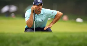 Jonathan Byrd Sitting In Golf Course Wallpaper