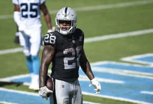 Josh Jacobs Football Action Wallpaper