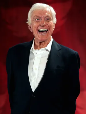 Joyful Senior Manin Black Suit Wallpaper