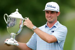 Jt Poston Smiling With Trophy Wallpaper