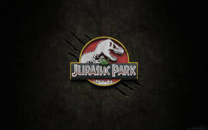 Jurassic Park Logo In Black Hue Wallpaper
