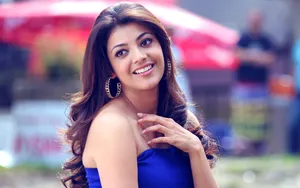Kajal Aggarwal Beautiful Smile Wallpaper