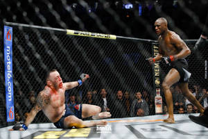 Kamaru Usman Knocked Down Opponent Wallpaper