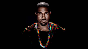 Kanye West With Big Gold Chain Wallpaper