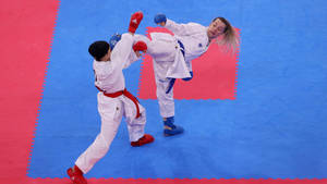 Karate Kick Fight On Mat Wallpaper