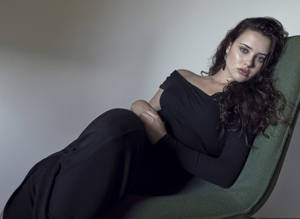 Katherine Langford In Couch Wallpaper