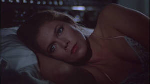 Kathleen Turner Immersed In A Classic Movie Scene. Wallpaper