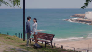 Kdrama Couple By The Beach Wallpaper