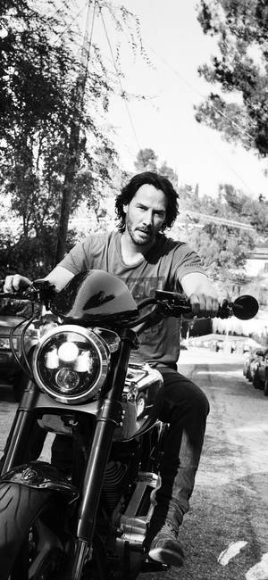 Keanu Reeves With Old Motorbike Wallpaper