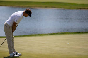 Keith Mitchell Staring At A Golf Ball Wallpaper