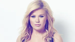 Kelly Clarkson In Blue Light Wallpaper